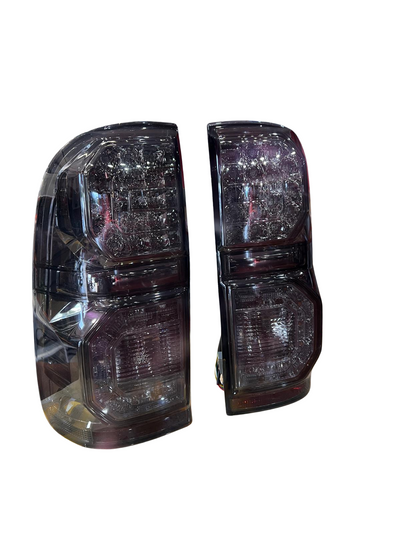 Half Smoked LED Tail Lights Pair Suitable for Toyota Hilux SR & SR5 2005-2014